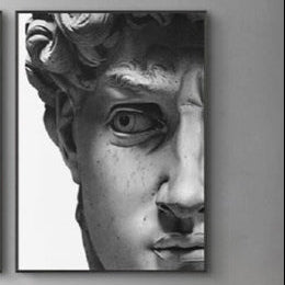 Quadro Volto David di Michelangelo, una rappresentazione artistica del celebre volto della scultura rinascimentale, simbolo di bellezza e perfezione.