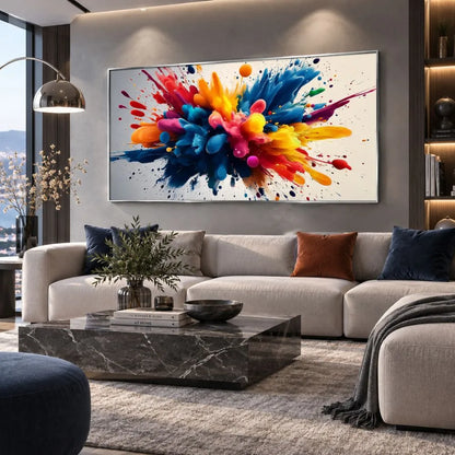 Quadro Esplosione di Colore: quadro su tela con cornice argento astratto vivace con tonalità intense (blu, rosso, giallo). Stampa su tela arte moderna colorata per un arredo dinamico.