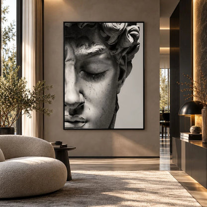 Quadro su tela con cornice nera minimal Volto David di Michelangelo, una rappresentazione artistica del celebre volto della scultura rinascimentale con occhio chiuso, simbolo di bellezza e perfezione.