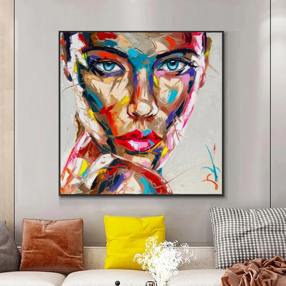 Quadro moderno Passione colorata con volto femminile astratto e sfumature accese, perfetto per arredamenti creativi e contemporanei.
