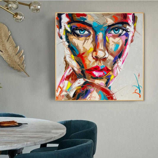 Quadro moderno Passione colorata con volto femminile astratto e sfumature accese, perfetto per arredamenti creativi e contemporanei.