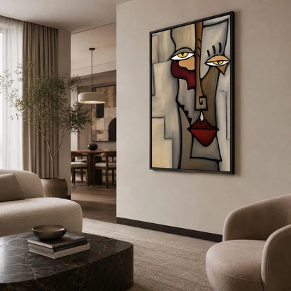 Quadro su tela Volto Astratto di P. Picasso con ritratto cubista, colori neutri e cornice nera minimal in soggiorno moderno