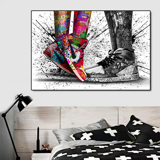 Quadro “Sneakers Graffiti”: paio di sneakers decorate con graffiti a colori su tela.